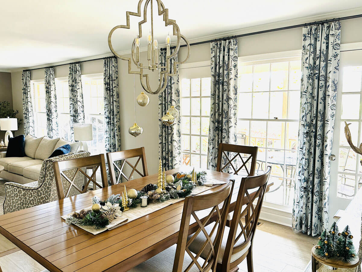 Custom blue and white floral draperies and curtains in a dining room in Chattanooga, Tennessee